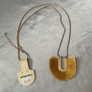 Long gold chain. Mustard yellow fringe horseshoe necklace